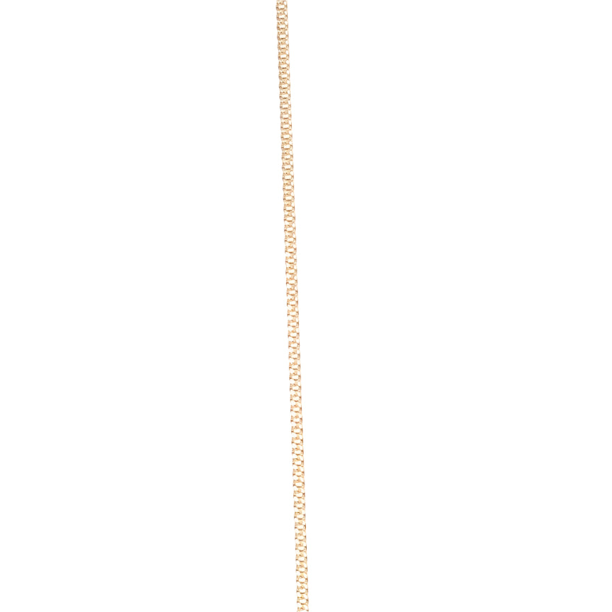 A polished 14k gold filled curb chain in the classic small Cuban style, with compact, uniform links that reflect light and hug the wrist with warmth and strength.