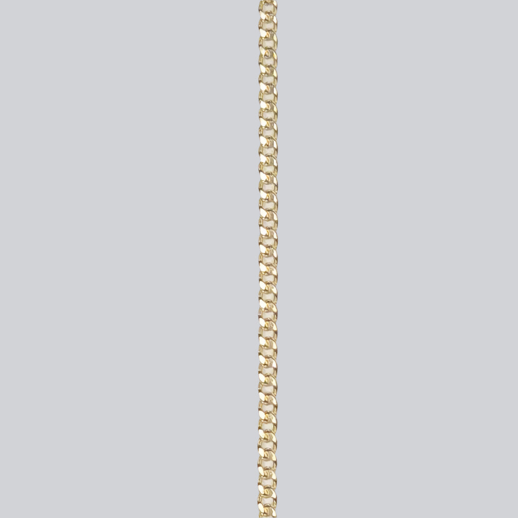 Gold filled 2mm small Cuban chain with a smooth, sunlit finish—crafted for lasting wear as a bold and intentional permanent jewelry choice.
