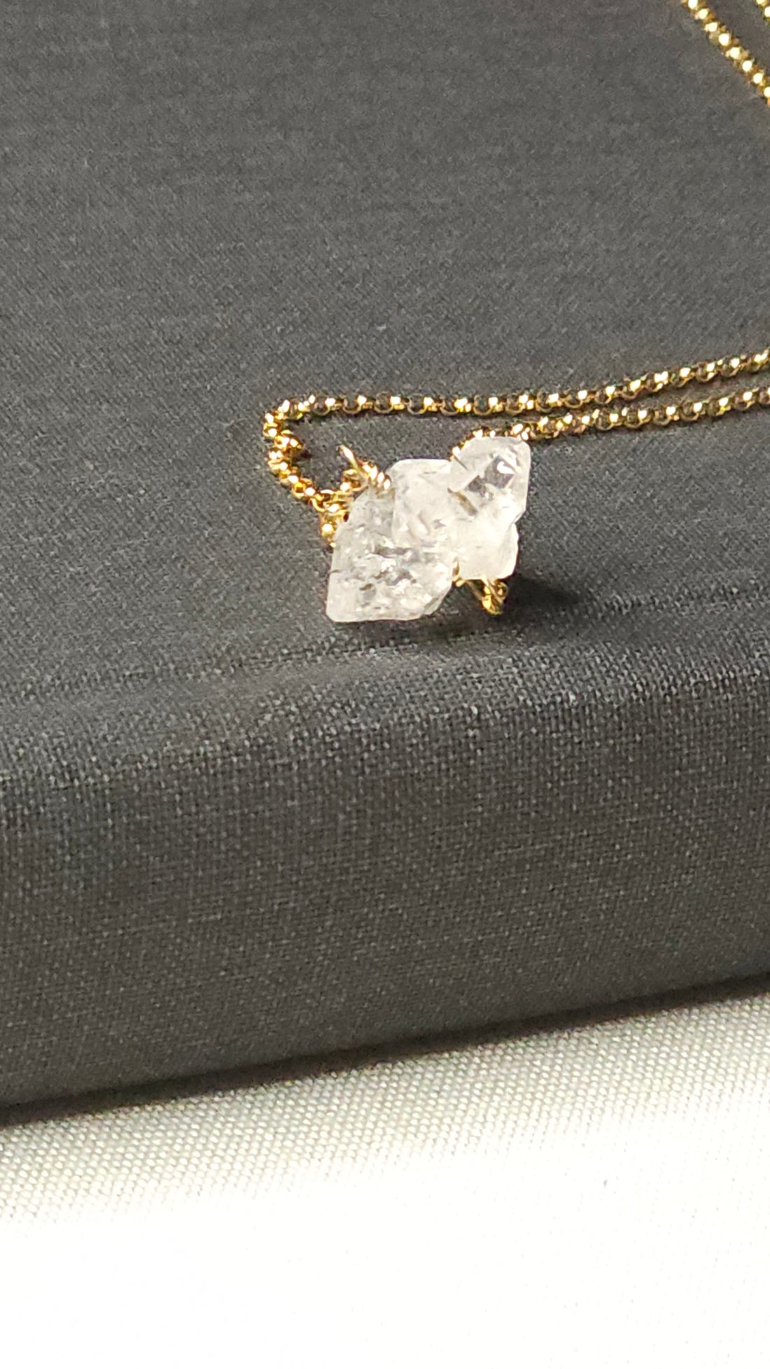Herkimer Diamond artisan wrapped on a 16in 14k Gold Fill chain with 2 inch gold fill extender chain. Naturally Double terminated clear crystal  