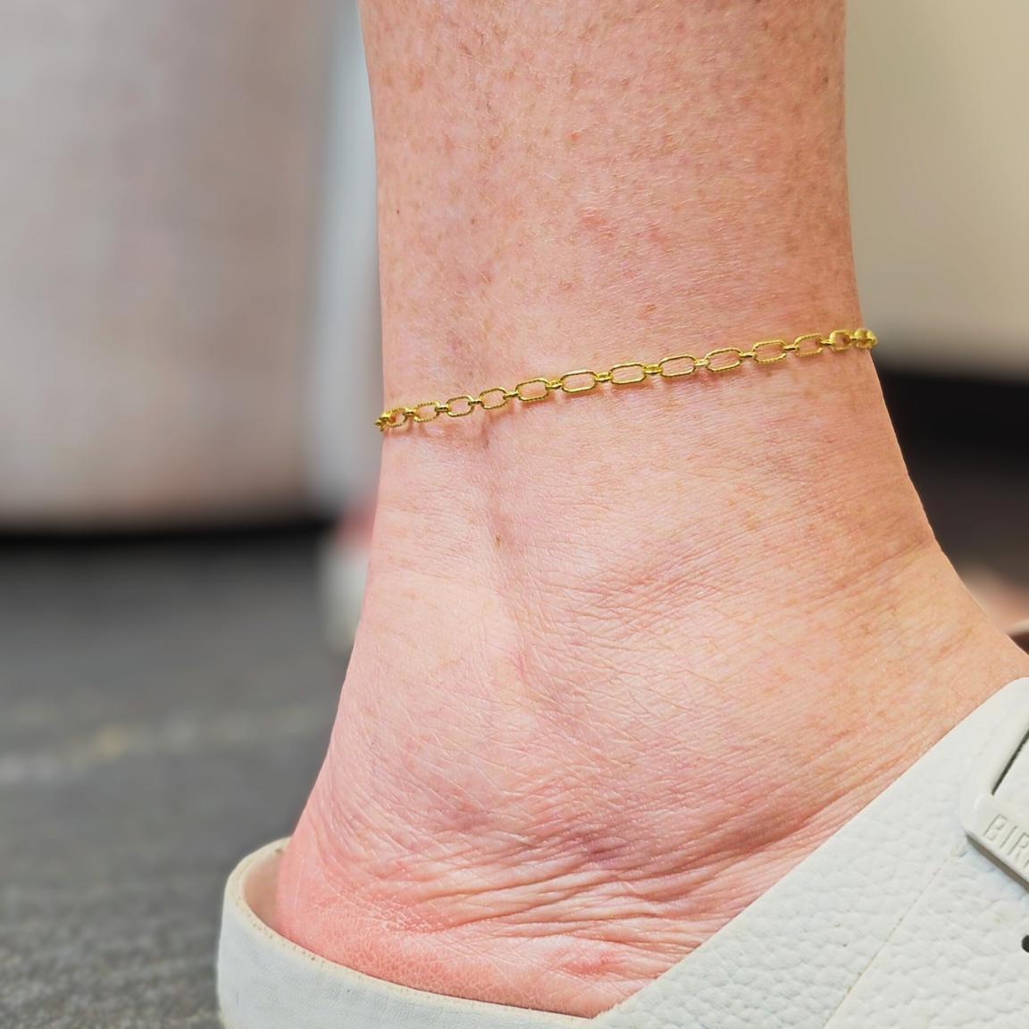 Twisted oval 14k gold filled chain named Astraea, featuring a lightly textured finish for permanent jewelry in Baltimore Maryland at Intentionally linked jewelry. 