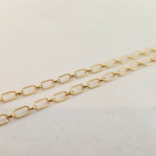 Twisted oval 14k gold filled chain named Astraea, featuring a lightly textured finish perfect for permanent jewelry at Intentionally Linked Jewelry in Baltimore Maryland 