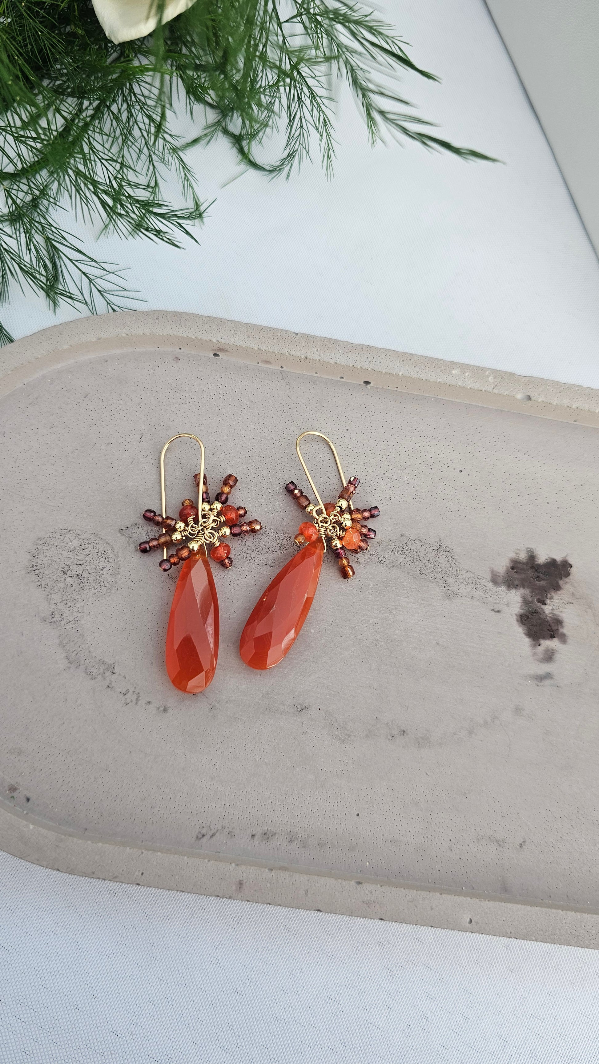 Phoenix Rising Earrings in Carnelian & Garnet. Handcrafted 14k gold fill jewelry for passion, joy, and transformation. Artisan-made earrings for your new beginning.