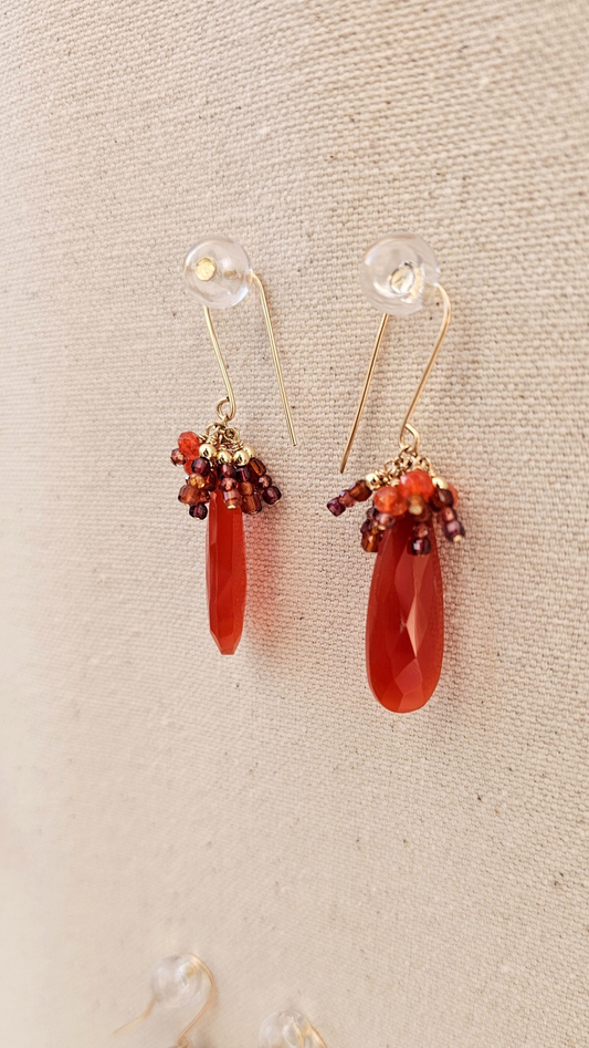Phoenix Rising Earrings: faceted Carnelian and Garnet wrapped in 14k gold fill. A radiant gemstone pairing for courage, joy, and the woman rising into her next chapter.