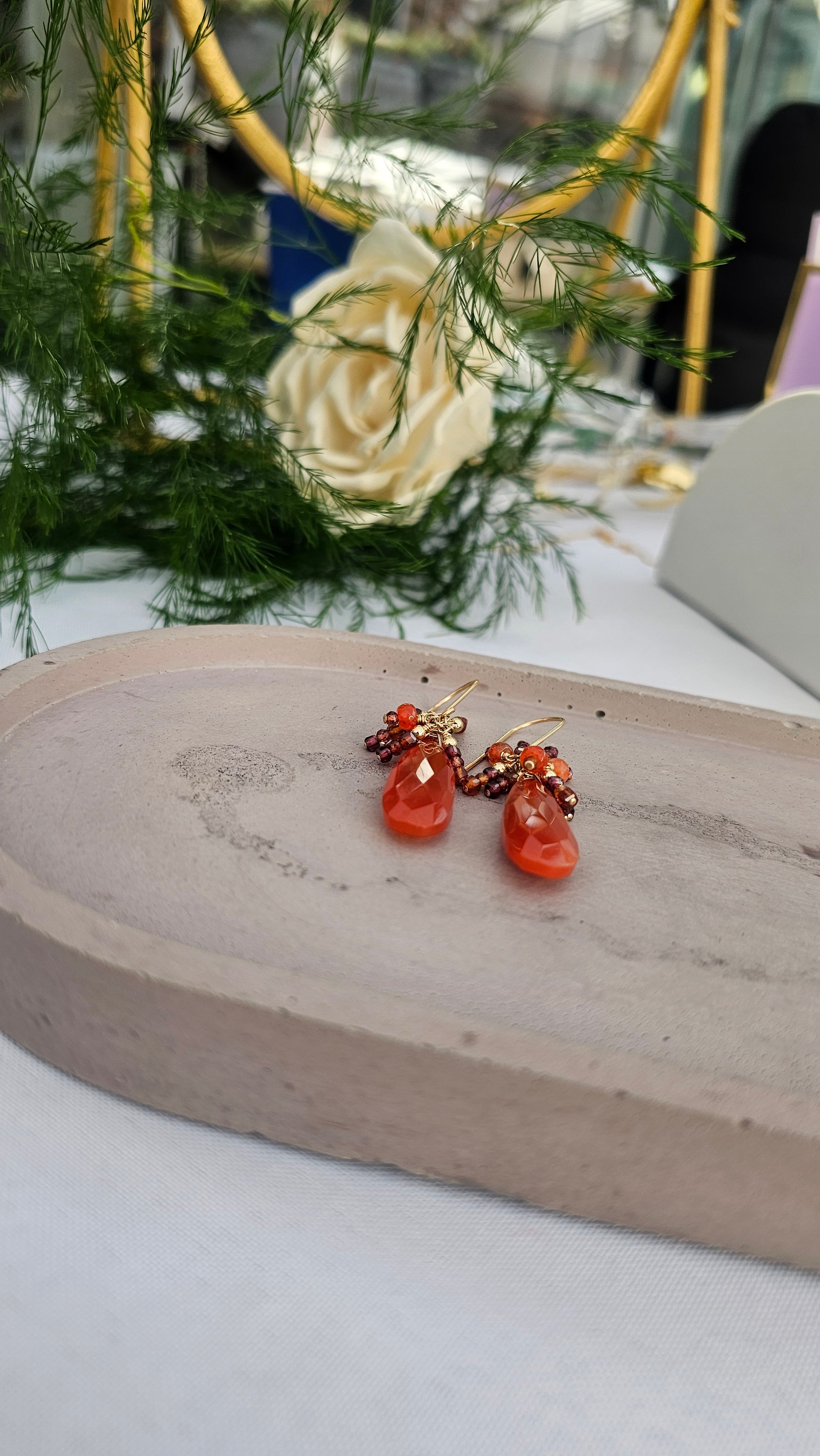 Handcrafted Carnelian & Garnet earrings in 14k gold fill. A fiery blend of passion, grounding, and renewal. Artisan gemstone jewelry designed for inspiring transformation.