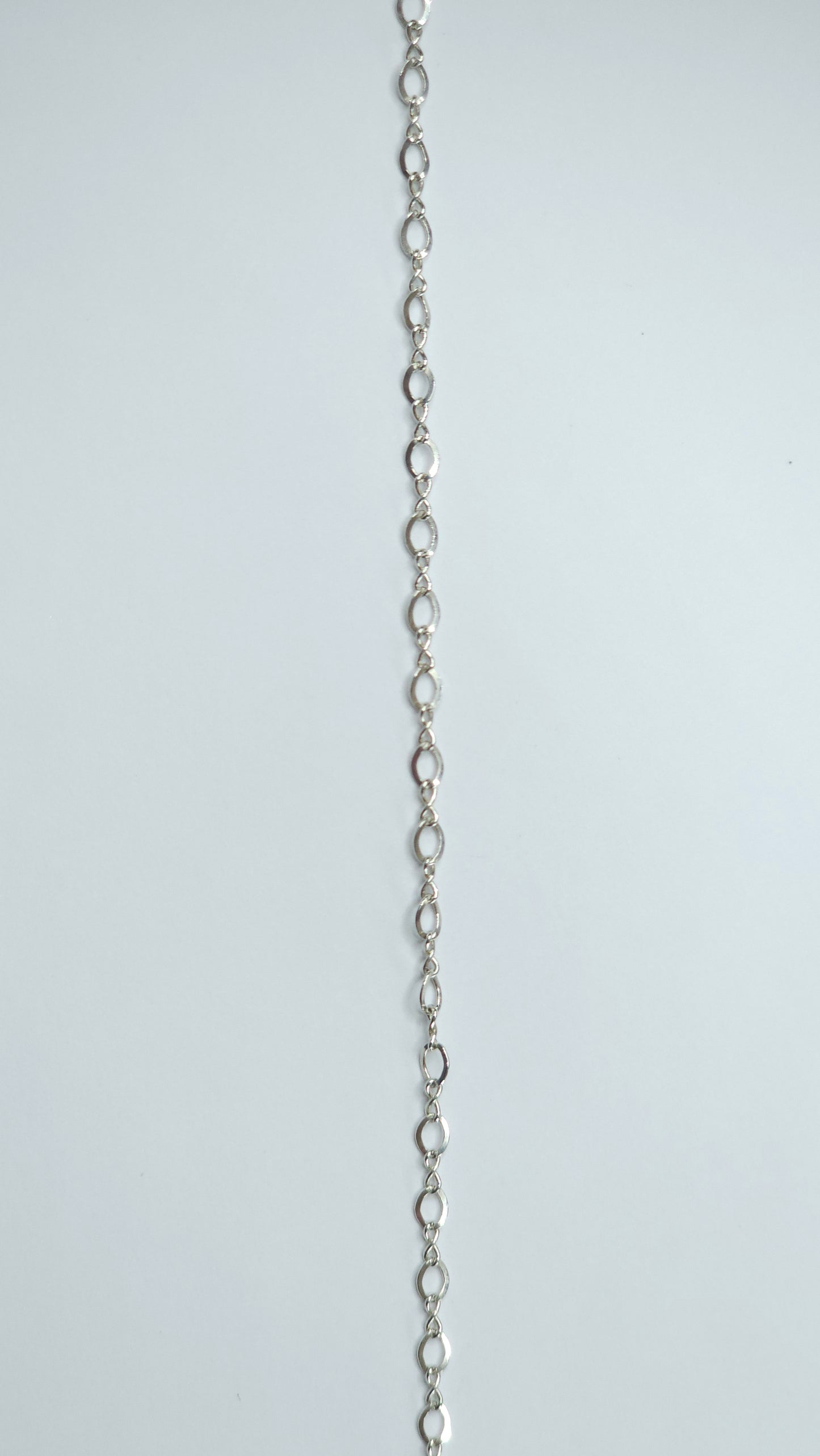Gold-filled chain with 3x2mm petite marquise-shaped links that naturally create movement and shine. The flowing, almond-shaped pattern makes it a beautiful choice for anyone seeking soft yet meaningful permanent jewelry. Marquise-style links offer a soft, feminine flow — Intentionally Linked Jewelry is the best for permanent jewelry in Maryland.