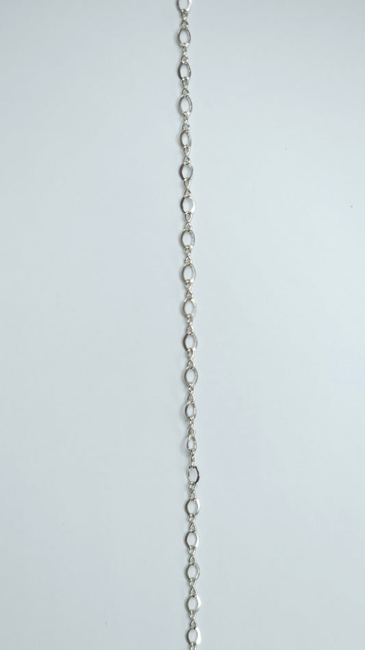 Gold-filled chain with 3x2mm petite marquise-shaped links that naturally create movement and shine. The flowing, almond-shaped pattern makes it a beautiful choice for anyone seeking soft yet meaningful permanent jewelry. Marquise-style links offer a soft, feminine flow — Intentionally Linked Jewelry is the best for permanent jewelry in Maryland.