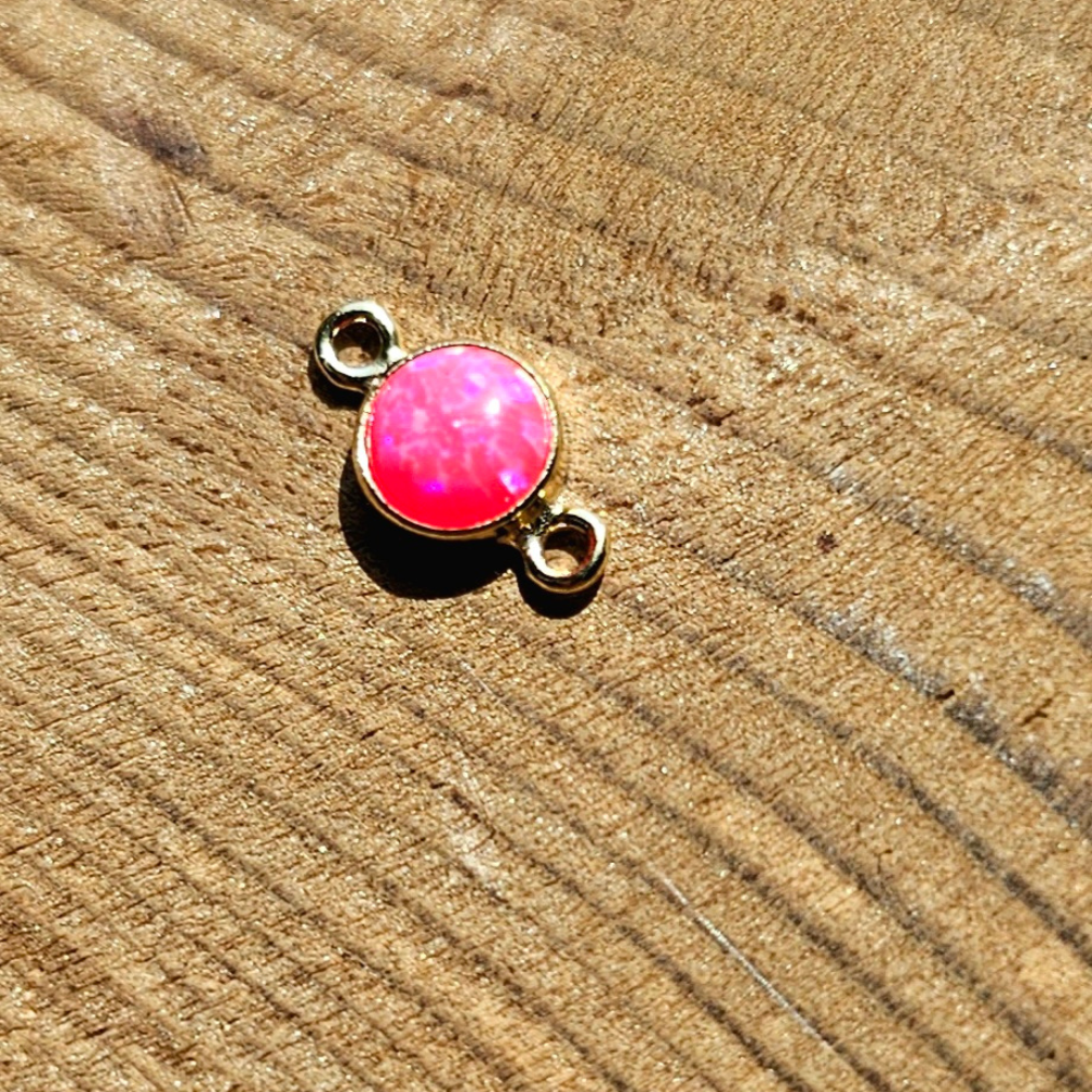 Pink Opal connector in 14k gold filled, symbolizing love and healing, welded for intentional permanent jewelry in Baltimore Maryland.