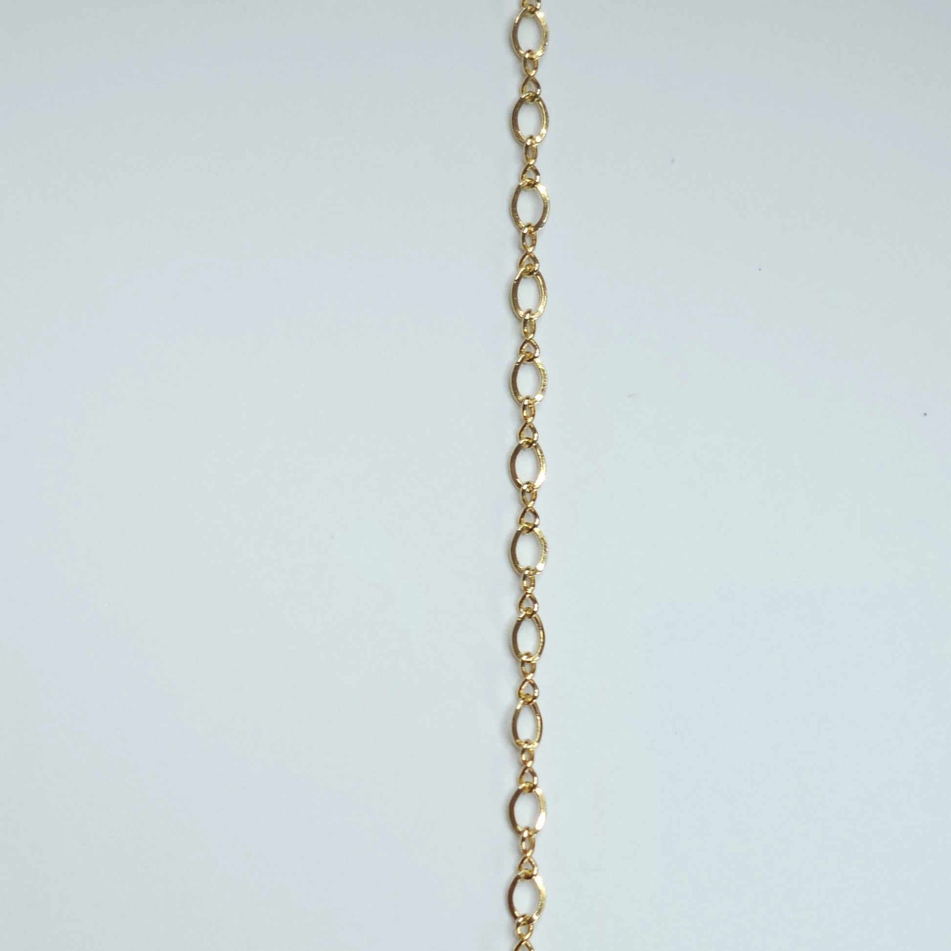 Gold-filled chain with 3x2mm petite marquise-shaped links that naturally create movement and shine. The flowing, almond-shaped pattern makes it a beautiful choice for anyone seeking soft yet meaningful permanent jewelry. Marquise-style links offer a soft, feminine flow — Intentionally Linked Jewelry is the best for permanent jewelry in Maryland.